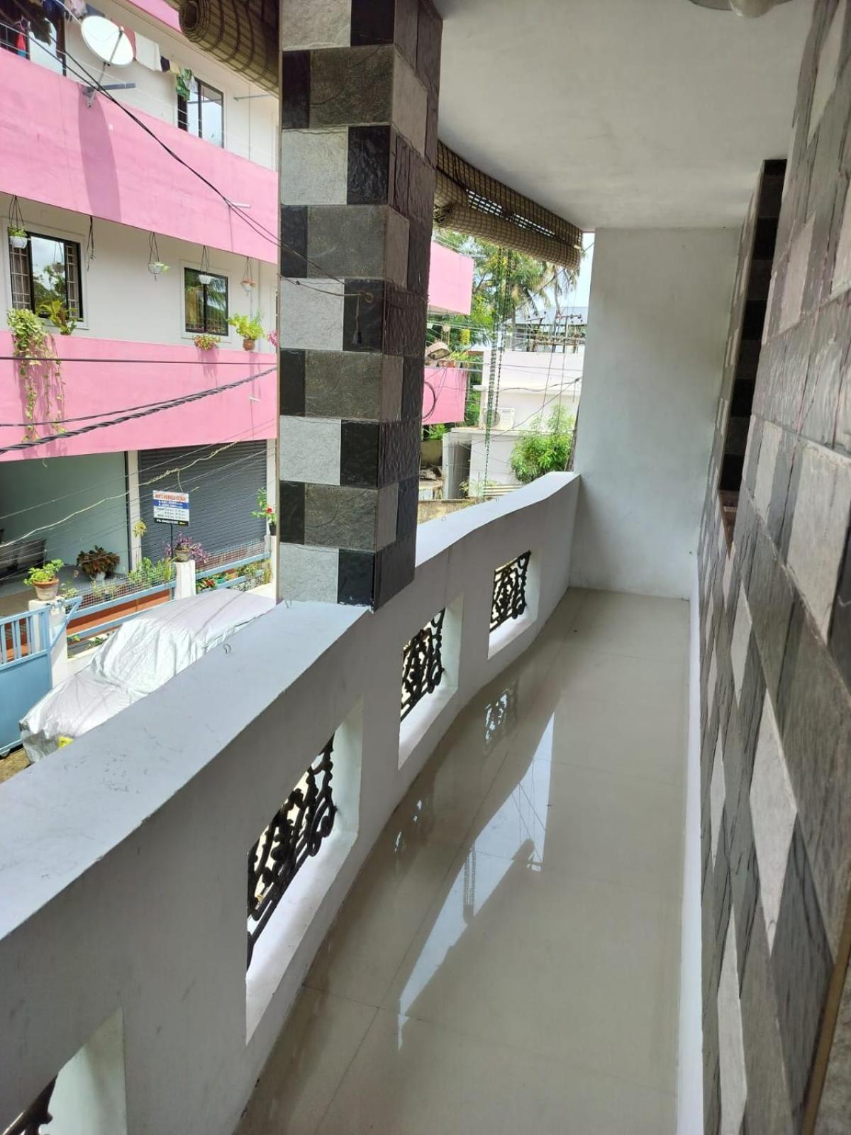 Apartamento Cozy Haven Kochi Exterior foto