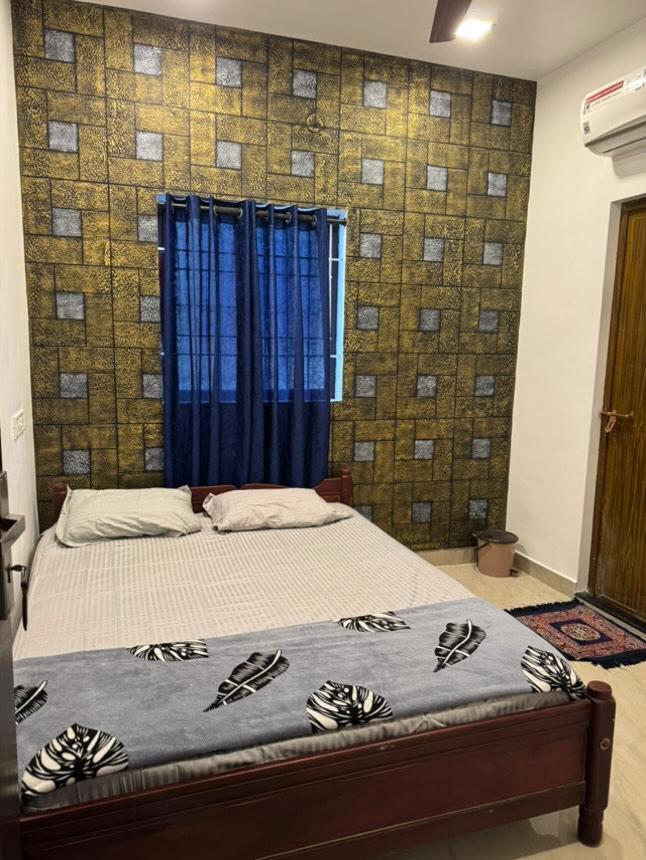 Apartamento Cozy Haven Kochi Exterior foto
